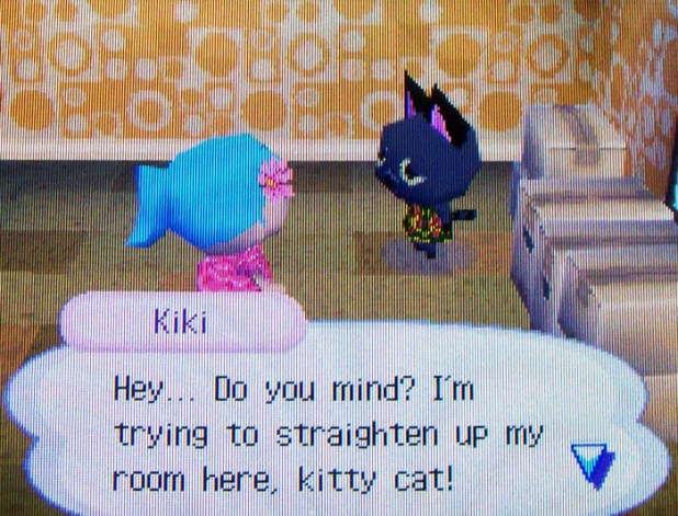 Kiki's trying to straighten her room