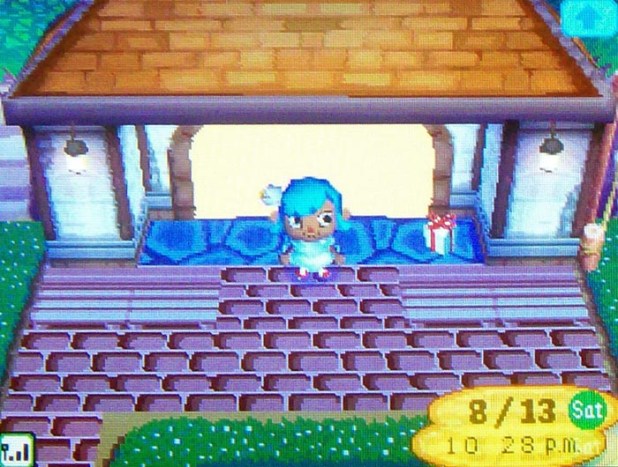 StarCity's entrance paved with dark brown brick roads and neat hedges