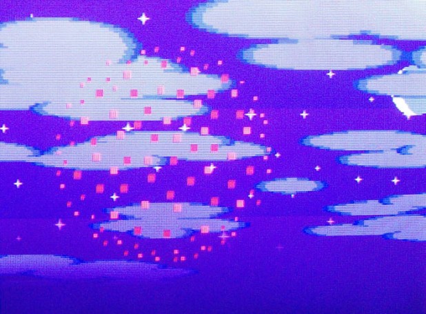 Pink firework on a purple sky