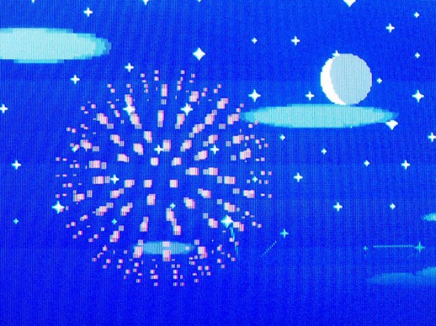 Yellow firework on a starry sky