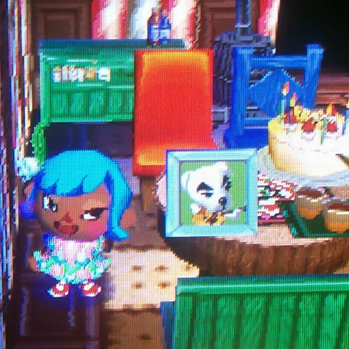 Showing off K.K. Slider's photo on my table