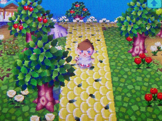 New golden-tiled, leaf-strewn main path