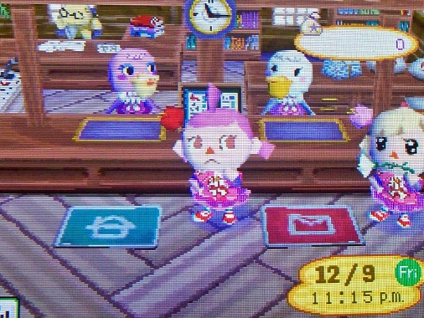 We both try on the Pelly dress in the Post Office, in front of Pelly and Phyllis