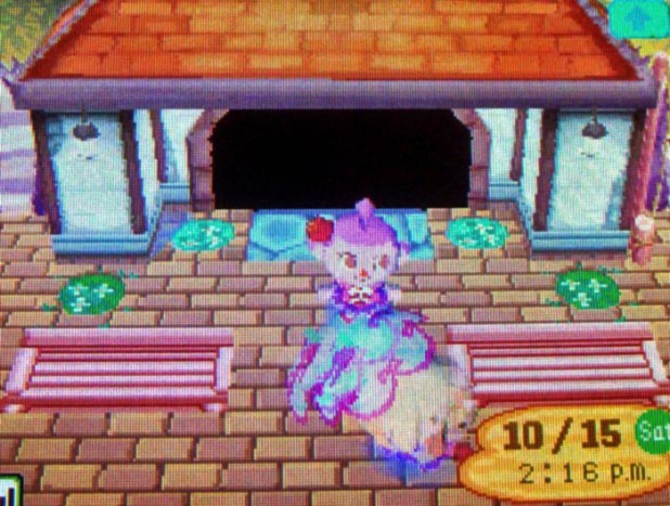 Admiring the pattern decorations at StarCity's entrance