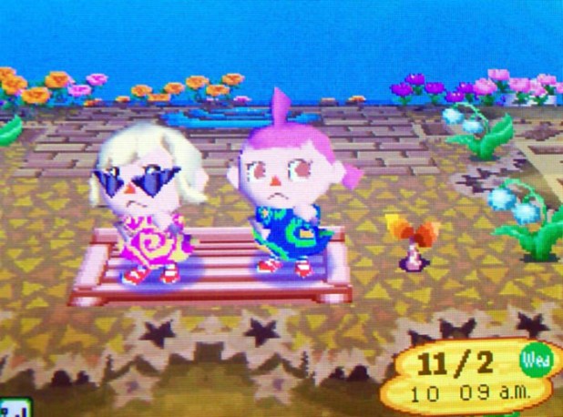 Kammile and I wearing Gracie shirts on StarCity's island