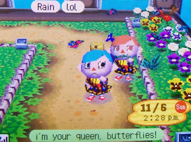 At the butterfly part of the museum's bug exhibit, in our butterfly dresses